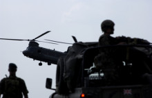 US Soldiers and Helicopter